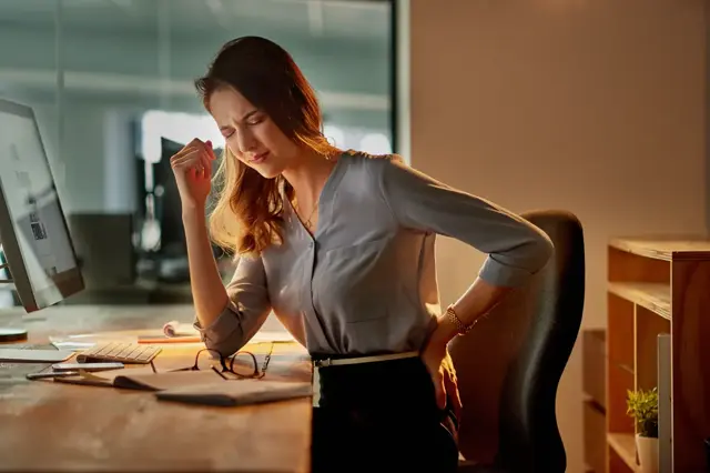 Businesswoman with neck pain